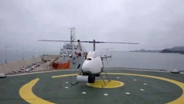 China effectively tests pilotless helicopters launched from transport